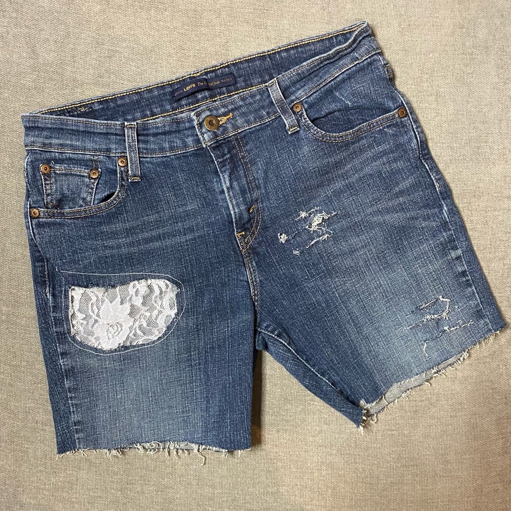 Levi’s Mid Rise Skinny Lace Distressed Jean Shorts